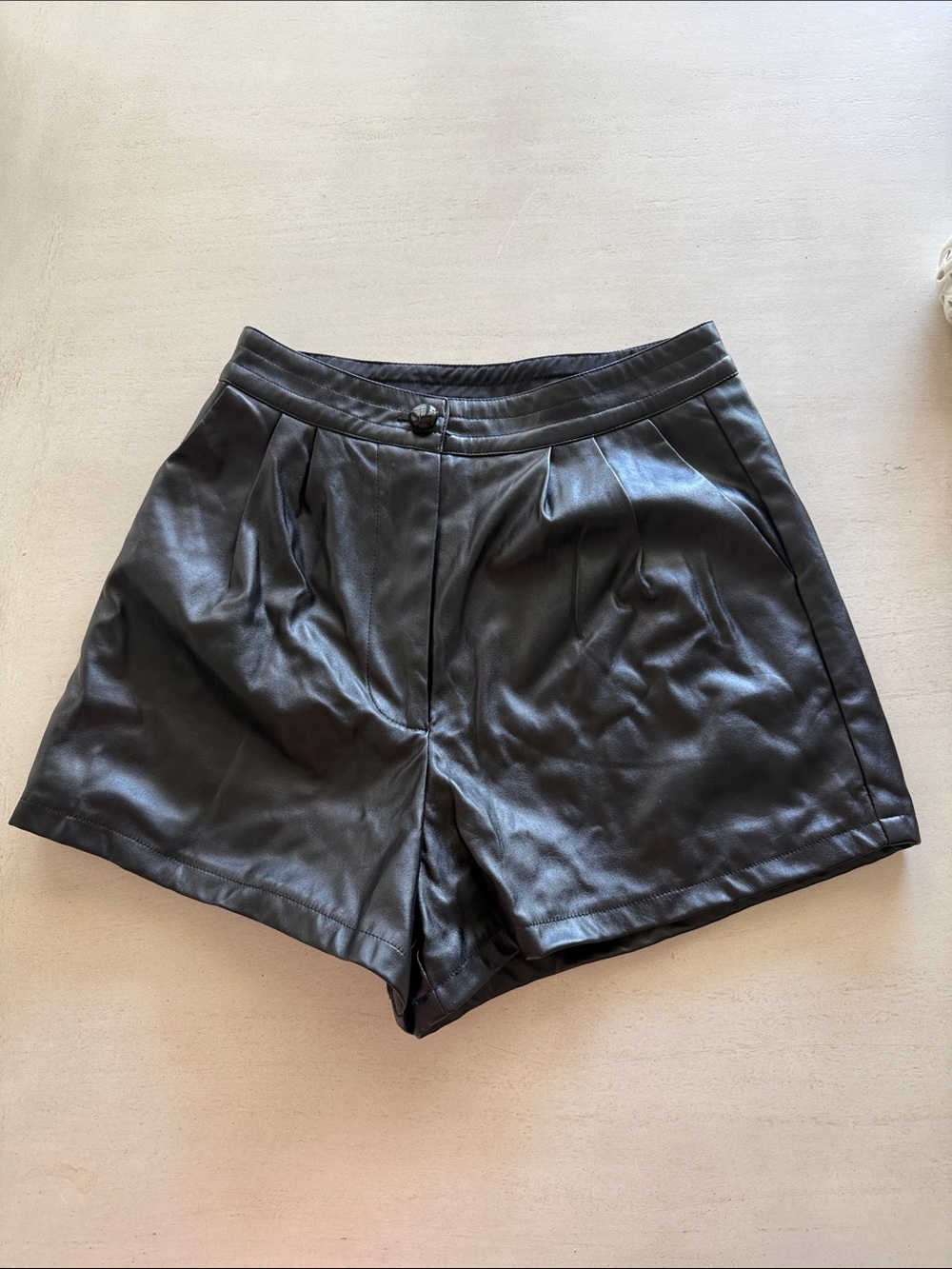 Princess Polly Black High-Waist Faux Leather Pleated Shorts